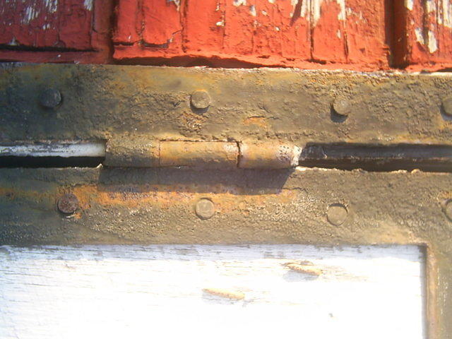 Rusty door hinge