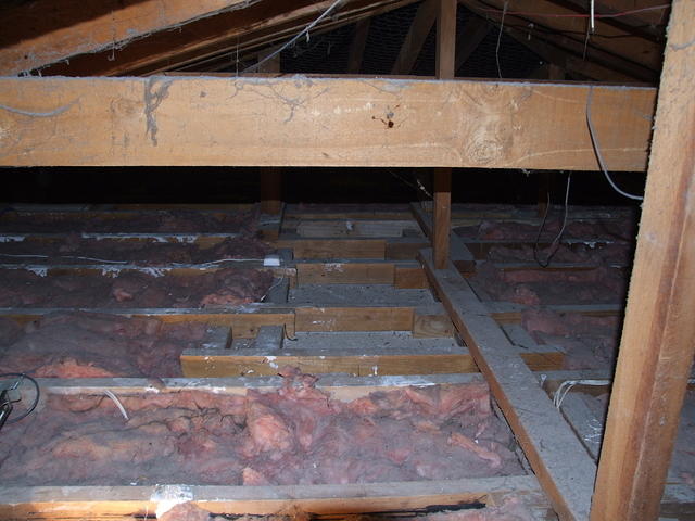 Attic with fiberglass insulation