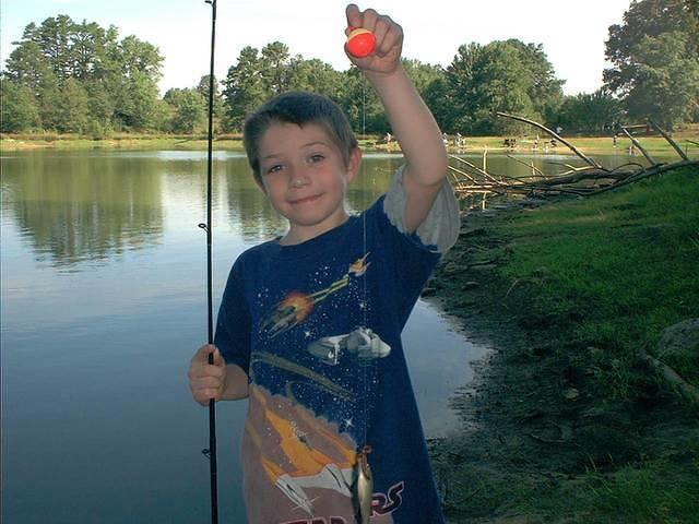 Little boy just caught a fish