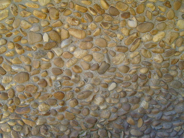 small cobblestones in concrete