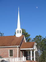 Church steeple with moon