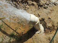 Compressor blowing sandy water from a water-bore, Wanneroo, Western Australia