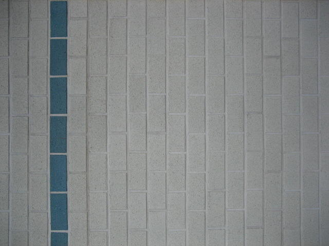 White and blue stone brick wall