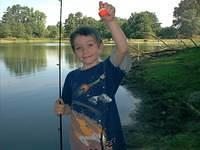 Little boy just caught a fish